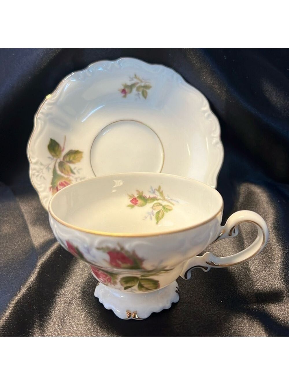 Hand painted porcelain,footed demitasse cup & saucer. Occupied Japan.
